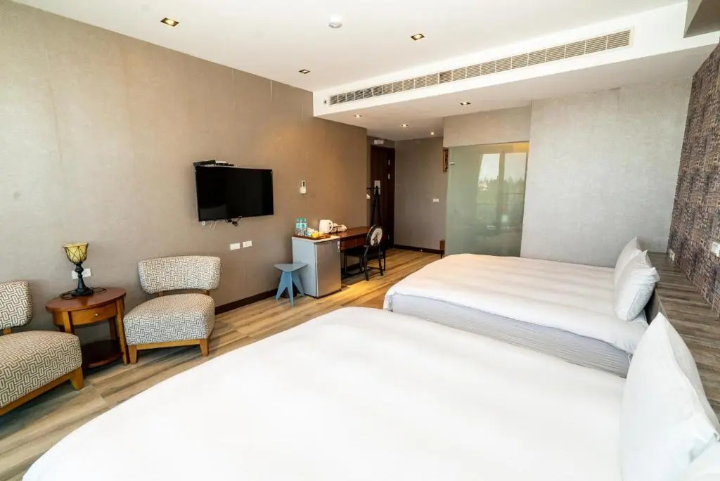 Standard Quadruple room with garden view