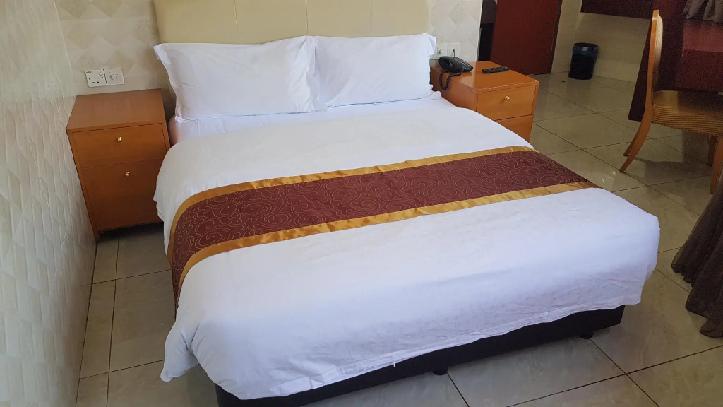 Suwara Hotel - Chambres