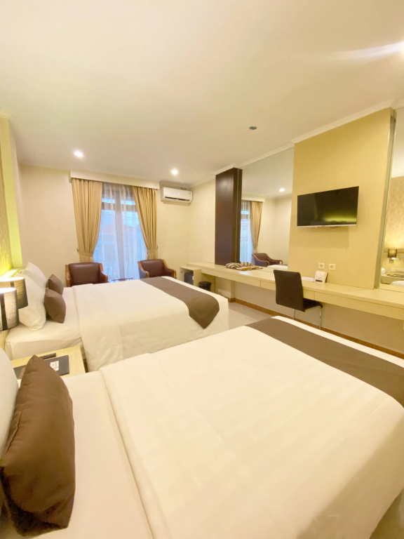 The Amrani Syariah Hotel - Chambres