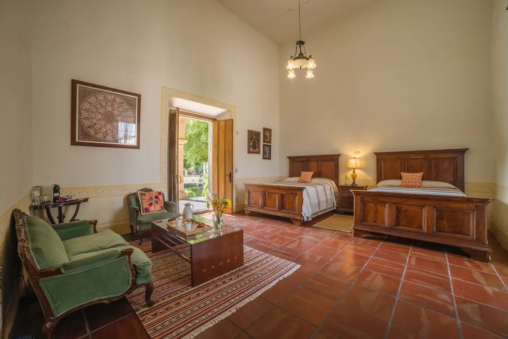 Standard Quadruple room with garden view
