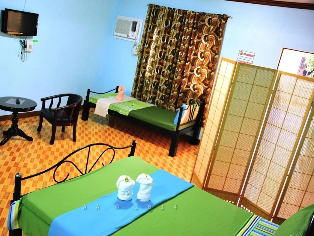 Antonio's Apartelle & Suites - Chambres
