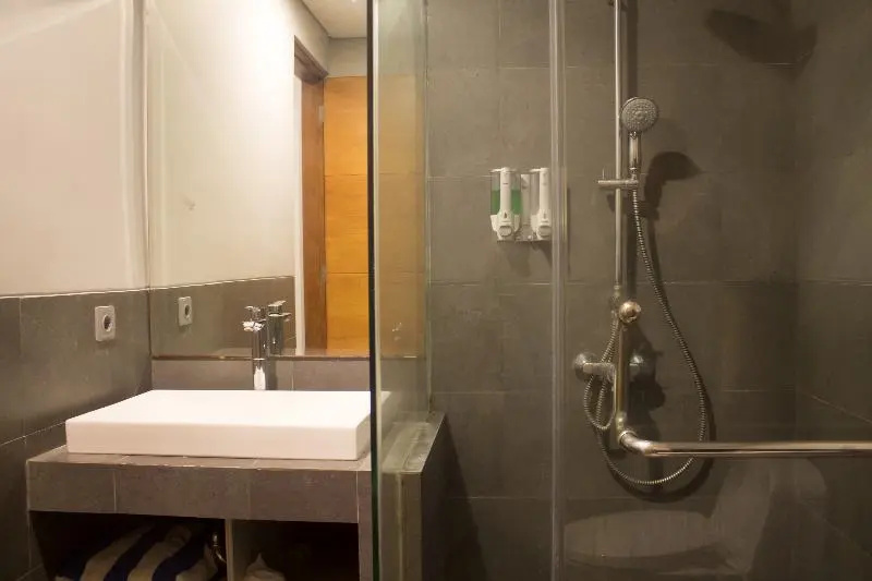 Kamini Legian Hotel - Chambres