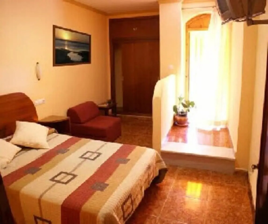 Standard Double room with balcony (full double bed)