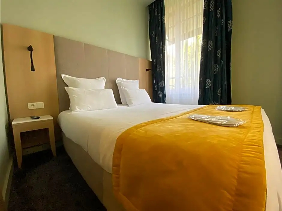 Golden Tulip Reims L'univers - Chambres
