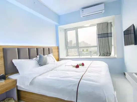 Manju Light Luxury Homestay (Henan University of Technology Metro Station)