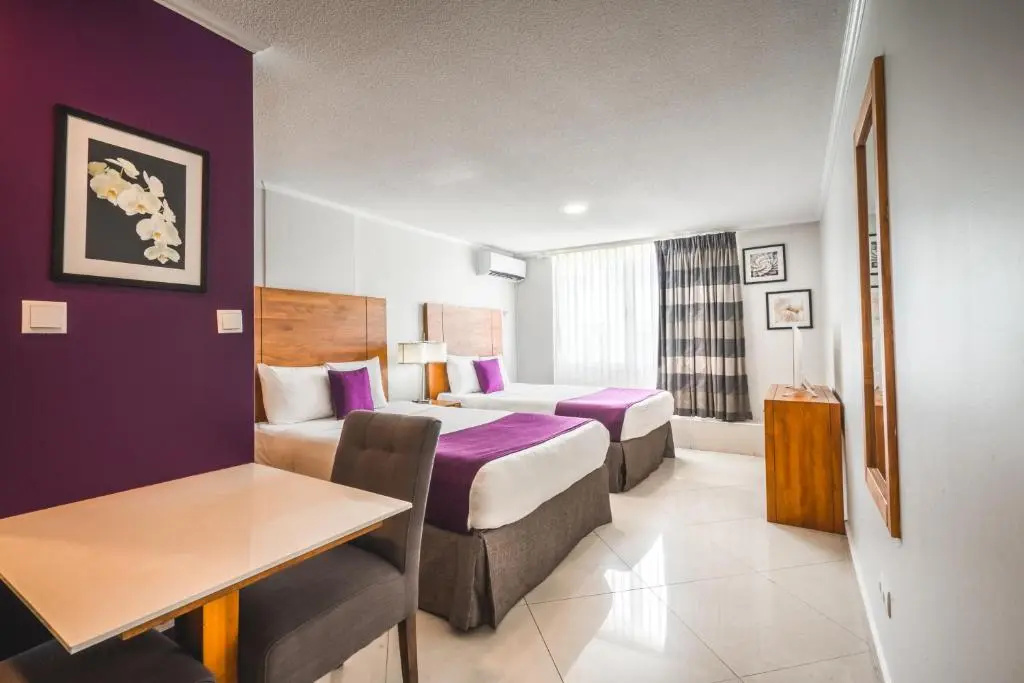 Majestic City Suites & Beach Hotel - Chambres