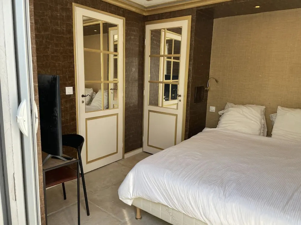 Voir la photo 2 — Chambre Luxe Piscine Jardin vue Solarium Palmeraie