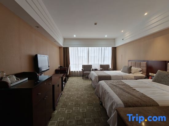 Xinli Hotel - Chambres
