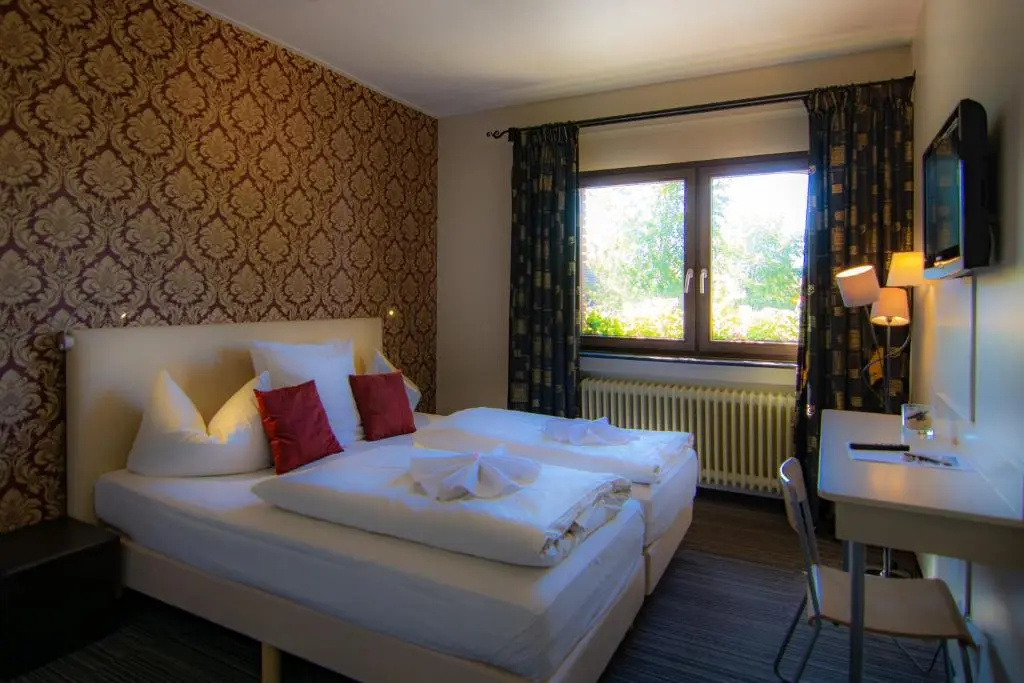 Hotel De Lange Man - Chambres