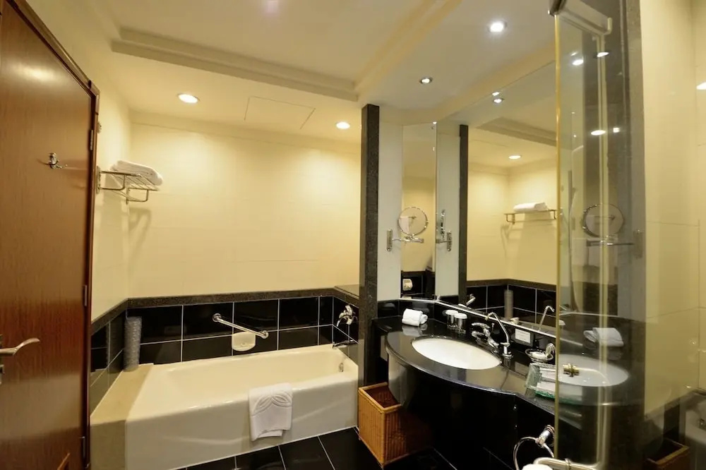 Gladden Hotel Shilong - Chambres