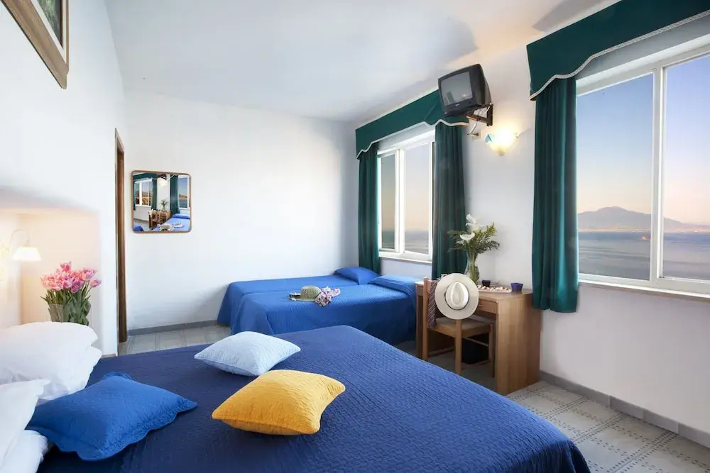 Standard Quadruple room with balcony and with sea view