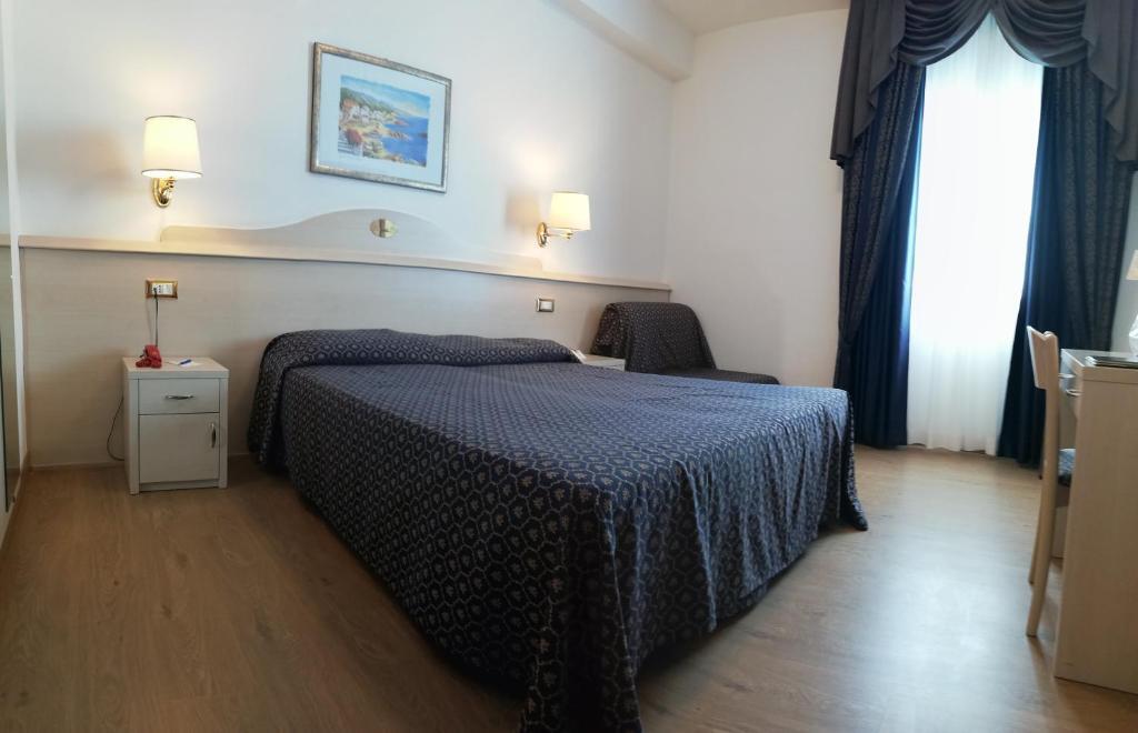 Трёхместный номер Standard в Hotel Caravelle & Minicaravelle