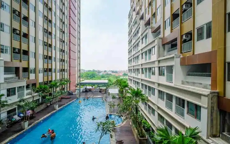Comfortable Pool View Studio Room Apartment at LRT City Jatibening By Travelio