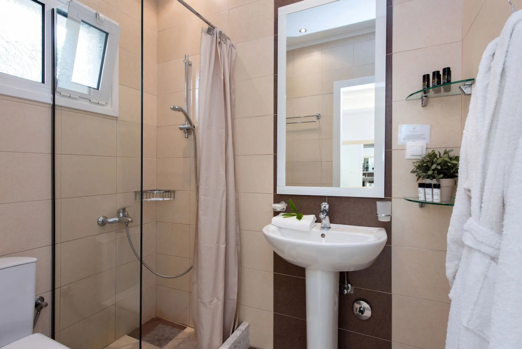 Melina Bay Boutique Hotel - Chambres