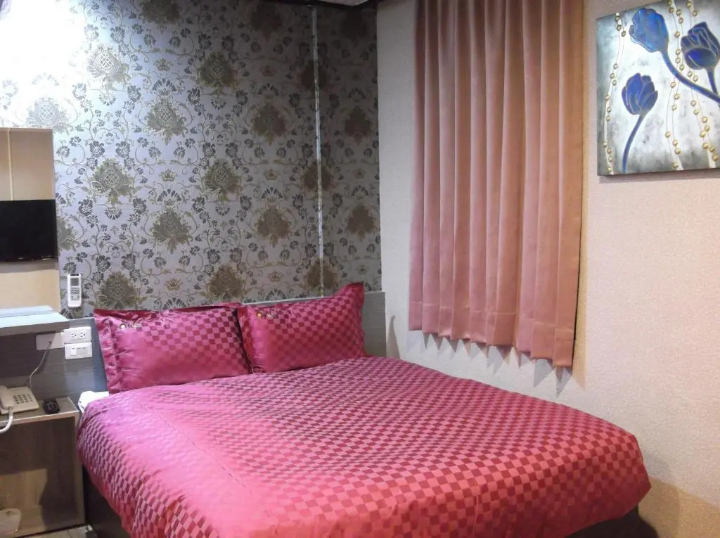 Bin Cheng Hotel - Chambres