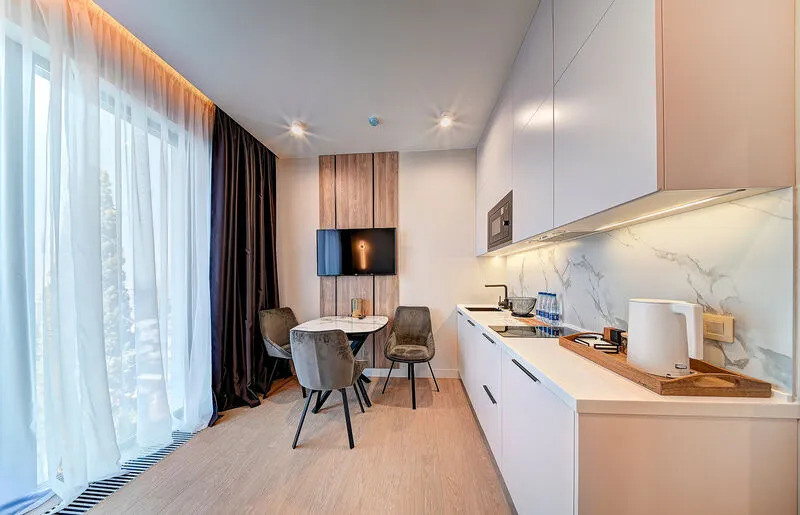 Двухместный номер Deluxe с видом на море двуспальная кровать в Real Apartments Sochi