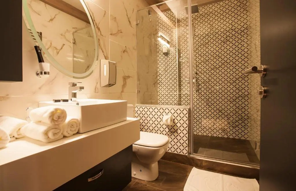 Atera Business Suites - Chambres