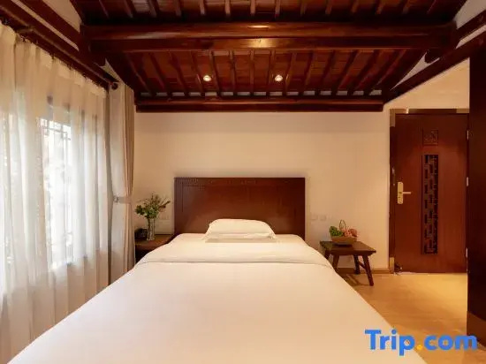 Gantong Flower In Garden Boutique Hotel - Chambres