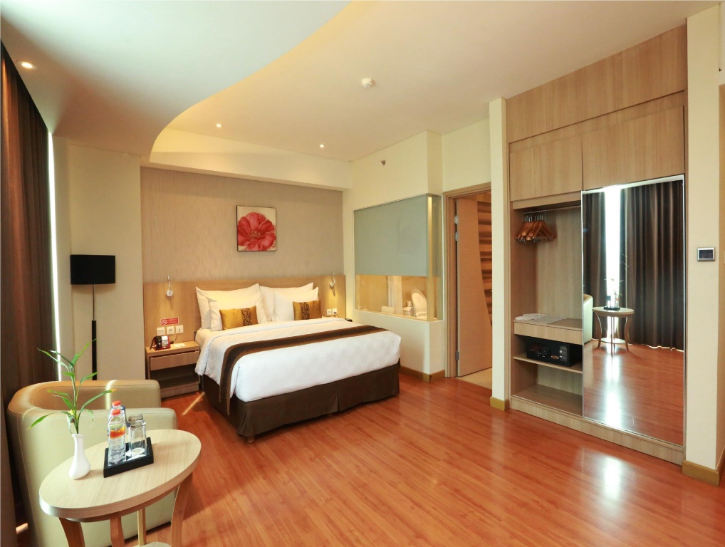 Golden Tulip Galaxy Hotel - Tap to explore photos