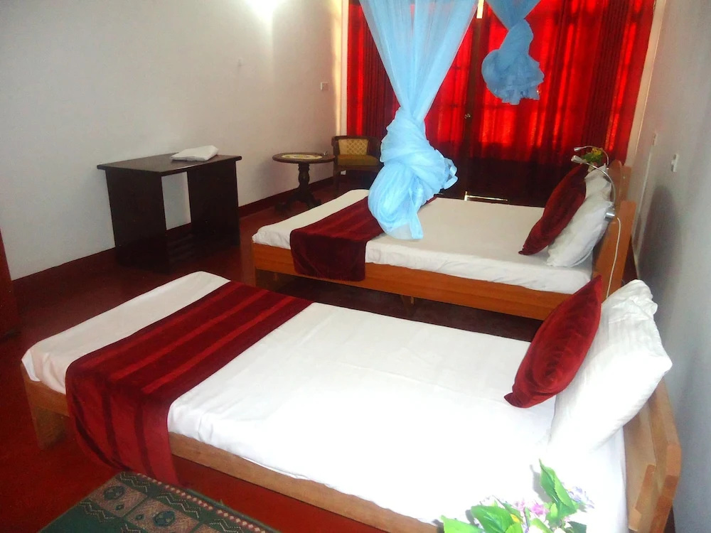 White Sand Beach Inn - Chambres
