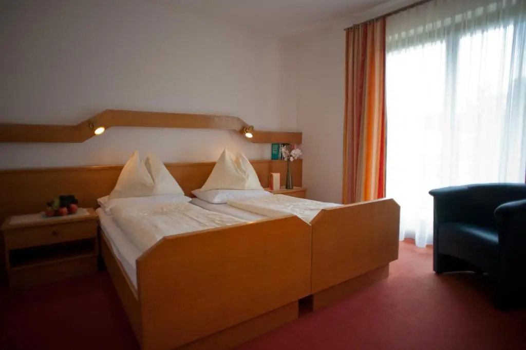 Simon - Hotel & Café - Chambres