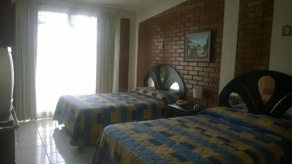 Mariana's Petit Hotel - Chambres