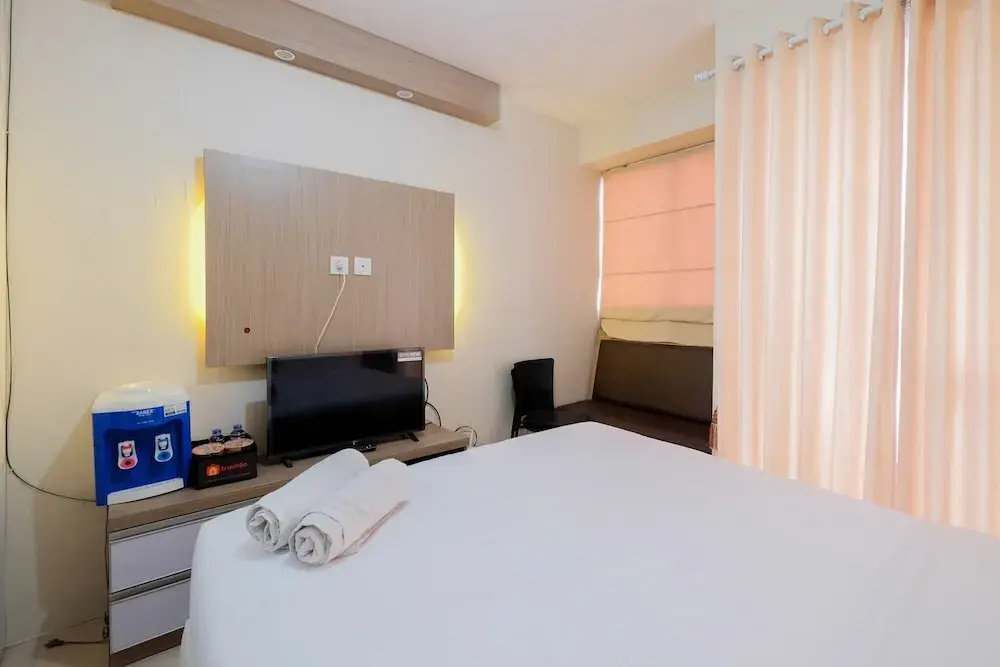 Minimalist Studio Room with City View @ Tifolia Apartment