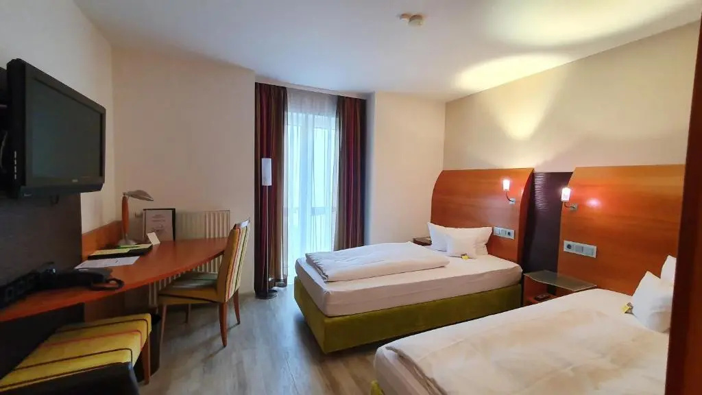 Astralis Hotel Domizil - Chambres