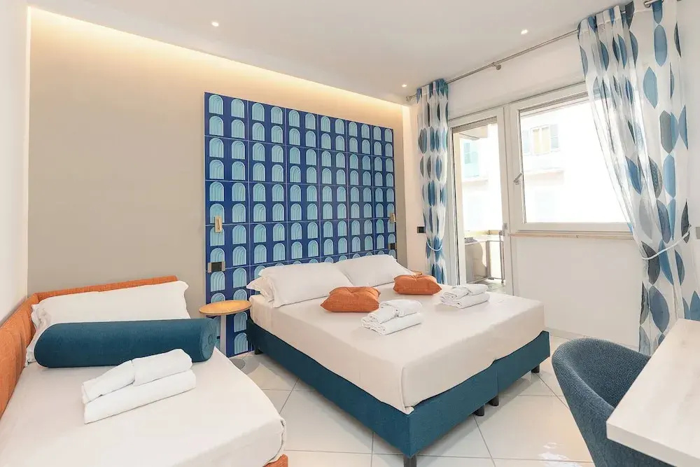 Deluxe Triple room with balcony and with sea view