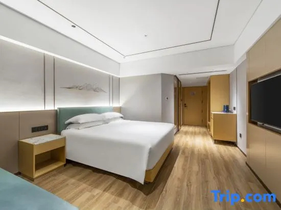 Xinyue Hotel - Chambres