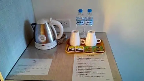 Qin Hai Hotel - Chambres