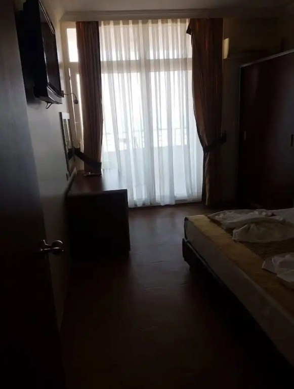 Standard Quadruple room with balcony and with sea view