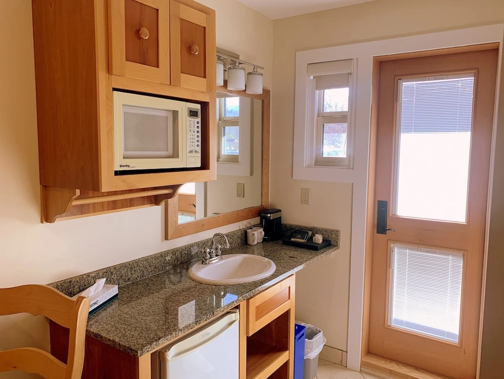 Deluxe Quadruple room with balcony