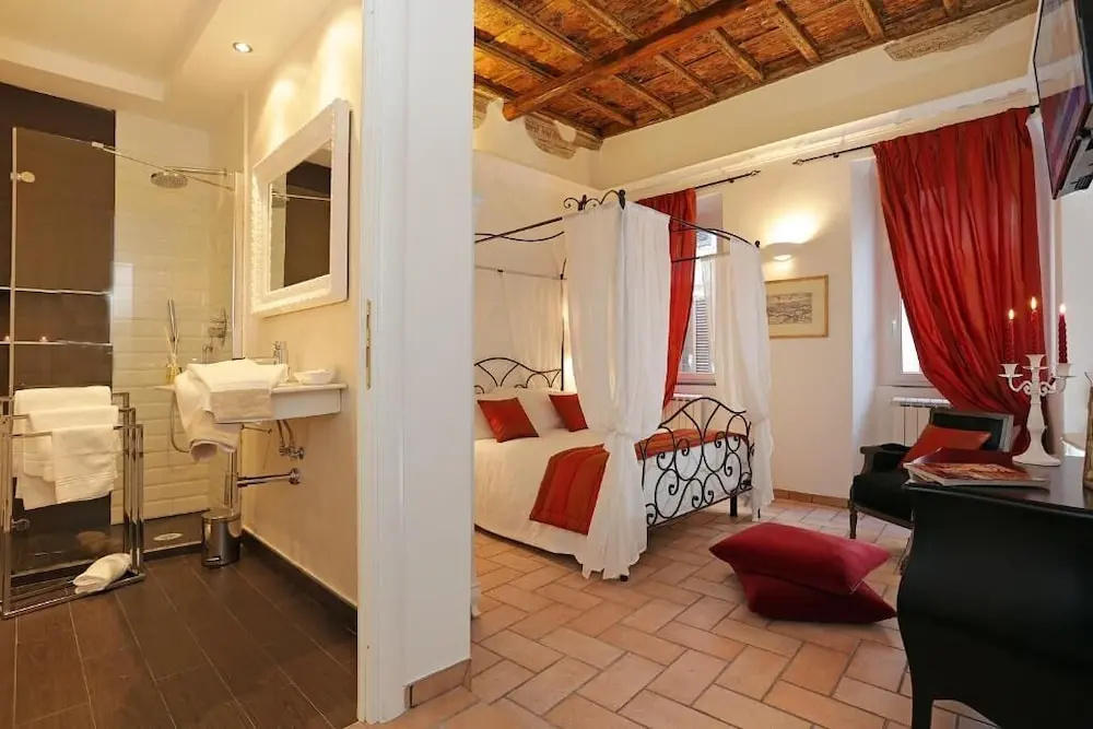 Madonna de’ Monti Suites - Chambres