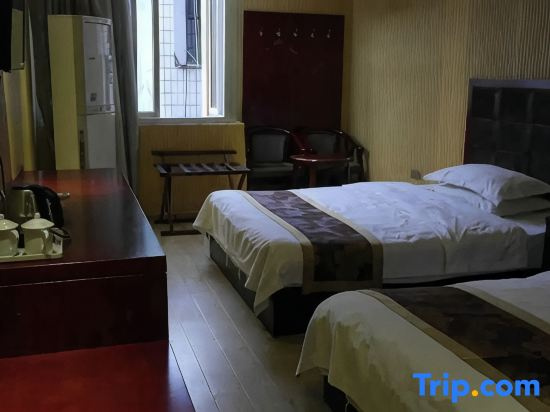 Huayun Hotel - Chambres