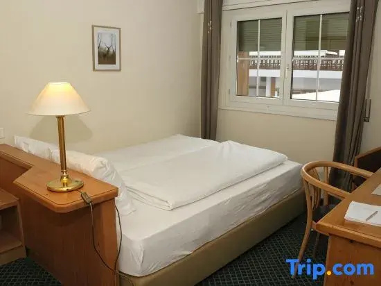 Grichting Hotel & Serviced Apartments - Chambres