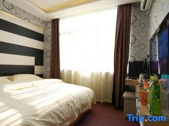 Huatian Hotel - Chambres