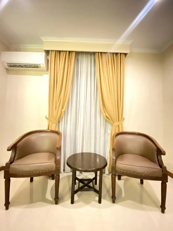 The Amrani Syariah Hotel - Chambres