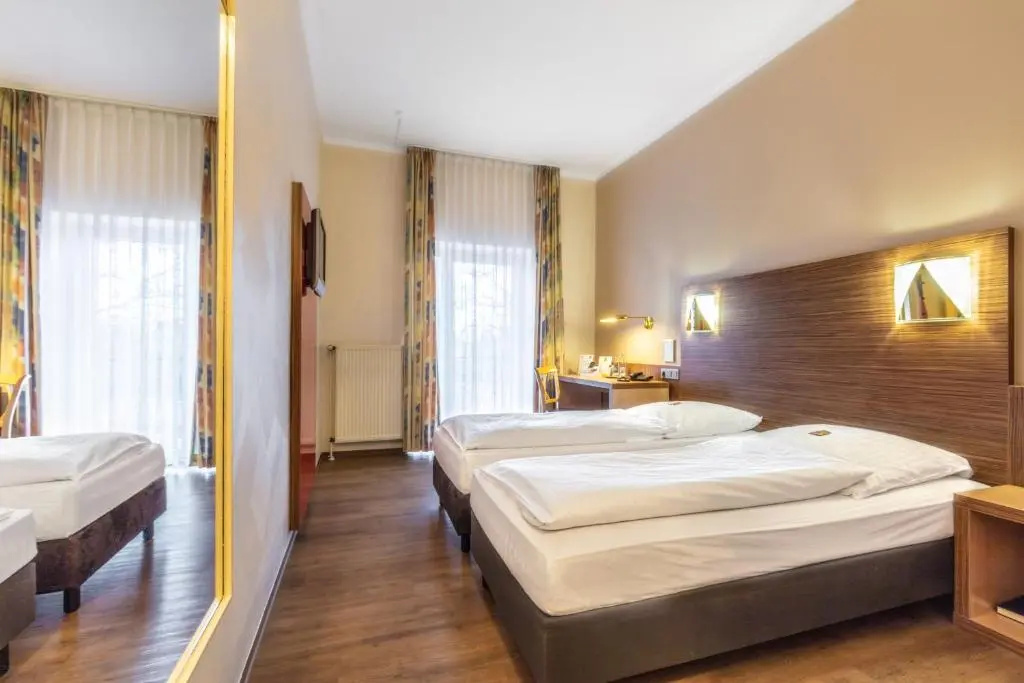 Sport - und Tagungshotel De Poort - Chambres