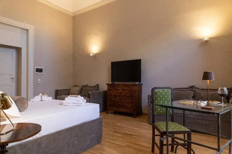 Deluxe Quadruple room with balcony