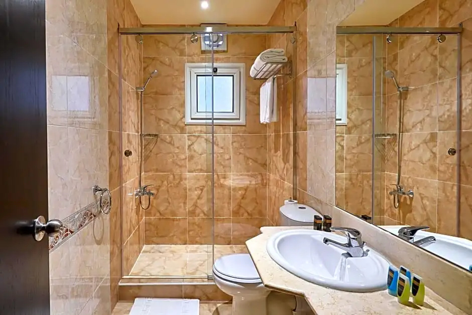 Golden Carven Hotel - Chambres