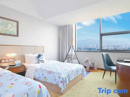 Gloria Plaza Hotel Qingdao - Chambres