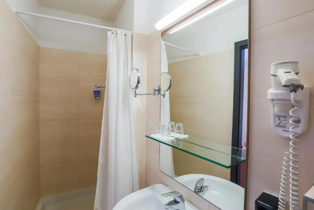 CE Plaza Hotel - Chambres