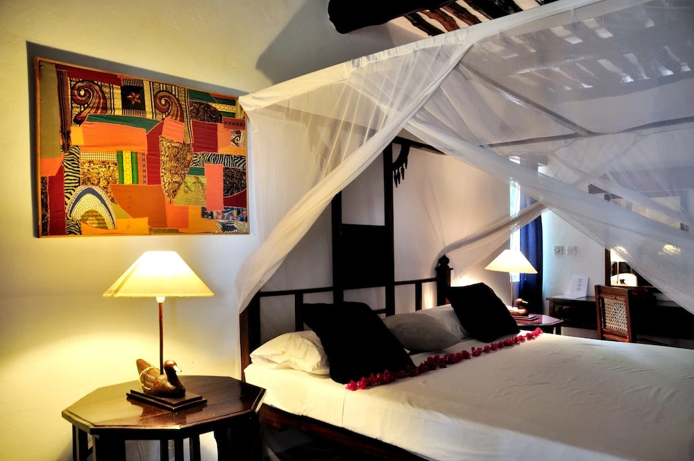 Четырёхместный номер Standard с видом на сад в Barracuda Inn Resort