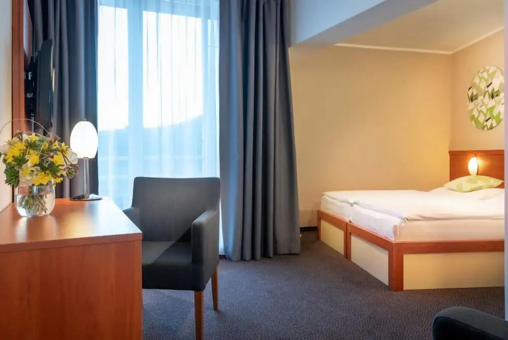 Atrium Hotel - Chambres