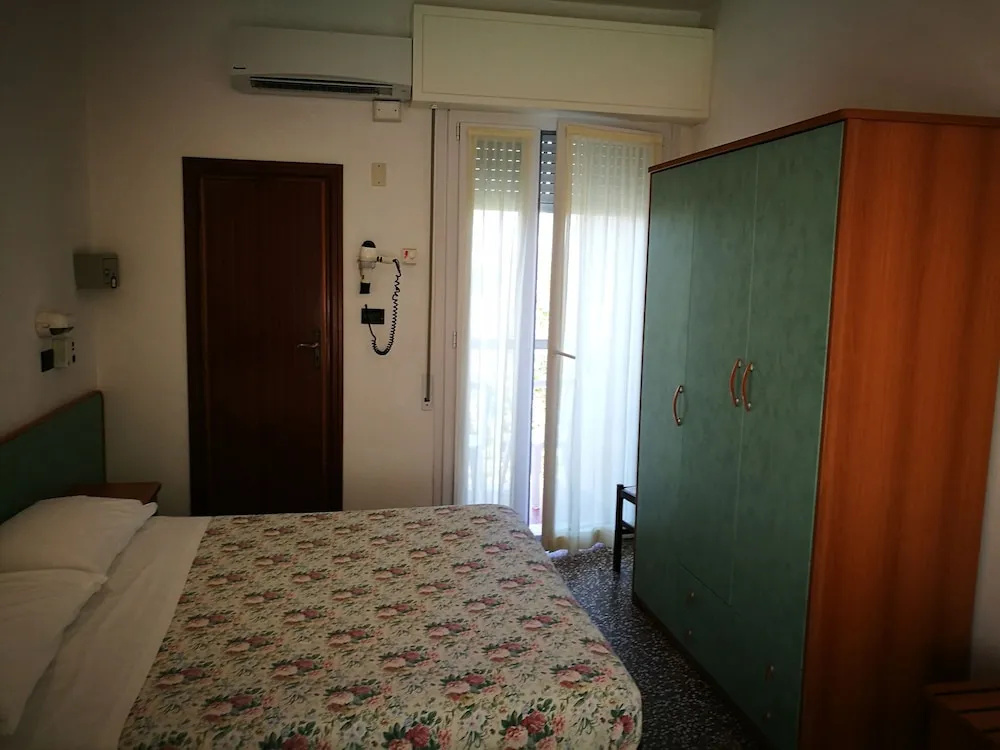 Standard Triple room with balcony and with garden view