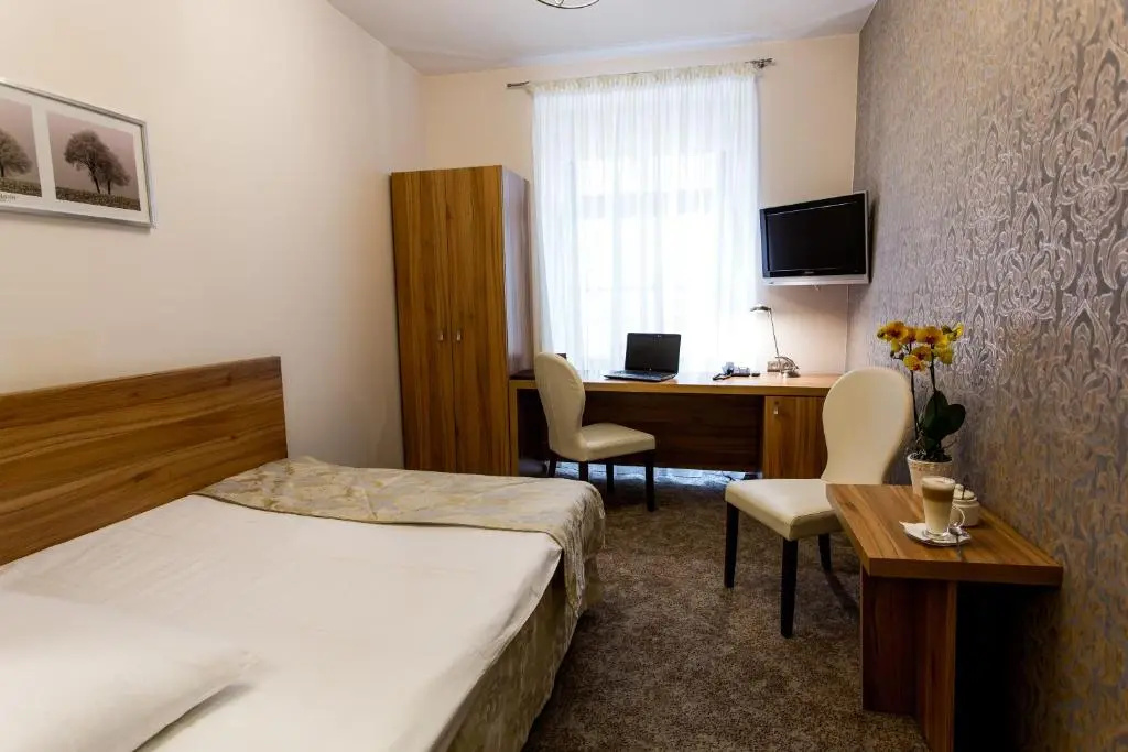 Patio Hotel - Chambres