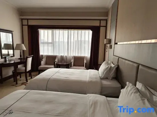 Junyi Hotel - Chambres