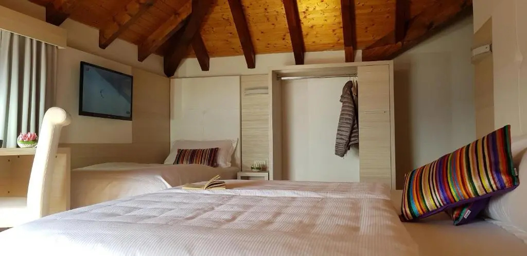 @ Home Hotel Locarno - Chambres