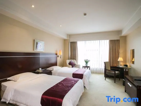 Tian Bao International Hotel - Chambres